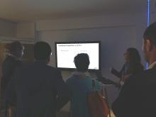 Ana María Morales presenting E-FLY demo to attendees from Energy Sector
